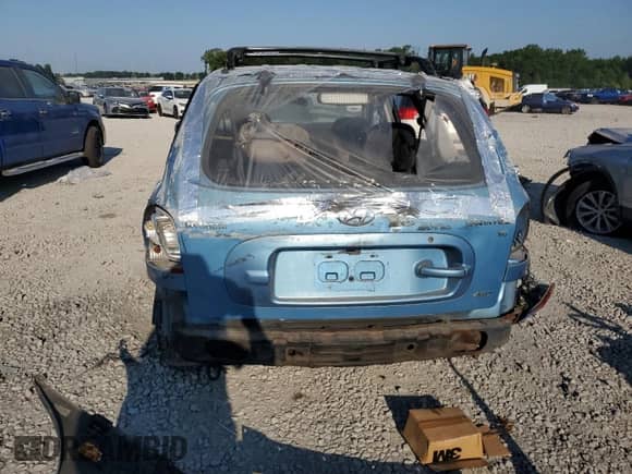 2003 Hyundai Santa Fe GLS с VIN KM8SC73D13U561890, выставлен на аукционе Copart как лот 69398864 с пробегом Не указан миль и Списание • Salvage title. История ставок и продаж доступна на DreamBid. Изображение 6.