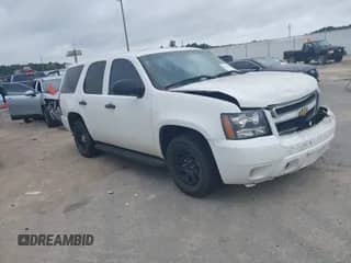 2013 Chevrolet Tahoe Commercial with VIN 1GNLC2E02DR311625, listed as a IAAI auction lot 42727642 with 158,335 mi miles and . Bid and sale history available at DreamBid. Image 1.