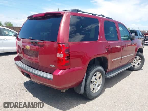 2010 Chevrolet Tahoe LT with VIN 1GNUKBE07AR268743, listed as a IAAI auction lot 42345256 with 249,514 mi miles and . Bid and sale history available at DreamBid. Image 4.