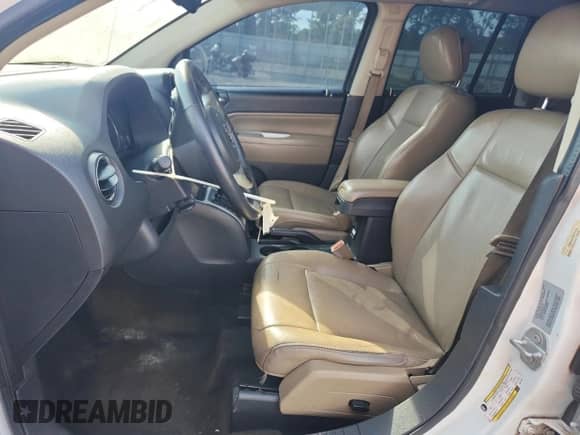 2016 Jeep Compass Latitude with VIN 1C4NJCEA7GD777378, listed as a Copart auction lot 56390385 with 123,186 mi miles and Salvage title. Bid and sale history available at DreamBid. Image 7.