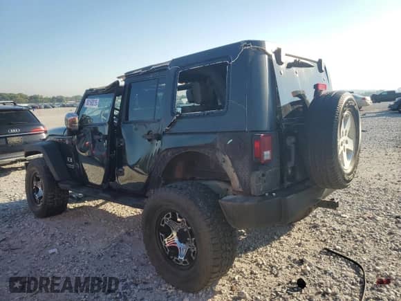 2008 Jeep Wrangler Unlimited X with VIN 1J4GA39198L531419, listed as a Copart auction lot 80160815 with 121,043 mi miles and Clean title. Bid and sale history available at DreamBid. Image 2.