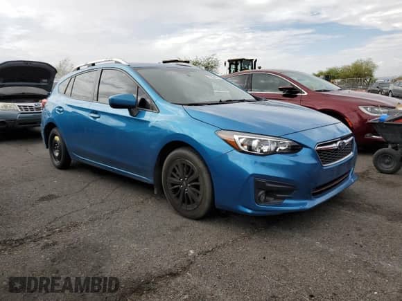 2018 Subaru Impreza Premium with VIN 4S3GTAD6XJ3733585, listed as a Copart auction lot 70594215 with 72,417 mi miles and Salvage title. Bid and sale history available at DreamBid. Image 4.