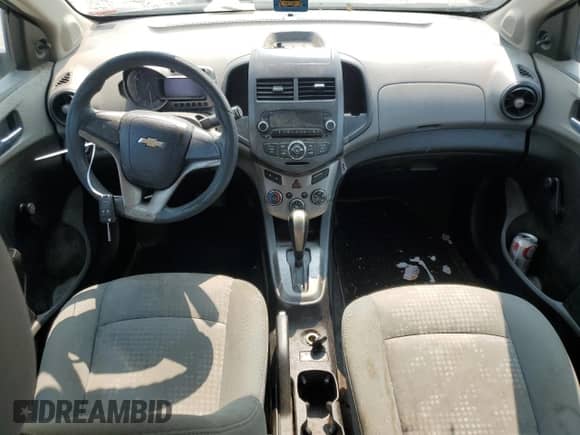 2012 Chevrolet Sonic LS с VIN 1G1JA6SH1C4109239, выставлен на аукционе Copart как лот 70859294 с пробегом 169 193 миль миль и Списание • Salvage title. История ставок и продаж доступна на DreamBid. Изображение 8.