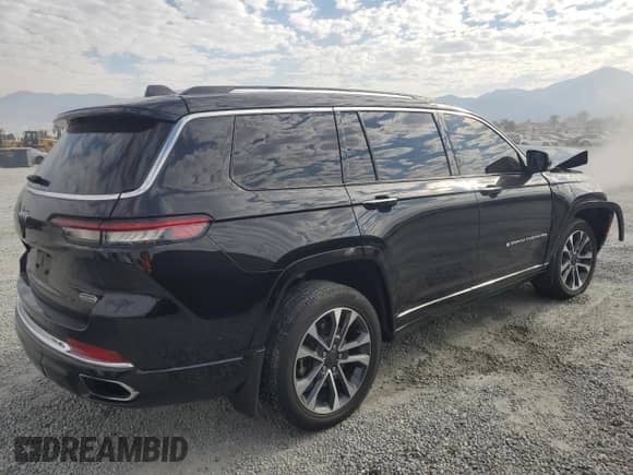 2023 Jeep Grand Cherokee Overland с VIN 1C4RJJDG7P8734485, выставлен на аукционе Copart как лот 70185364 с пробегом 47 148 миль миль и Списание • Salvage title. История ставок и продаж доступна на DreamBid. Изображение 3.