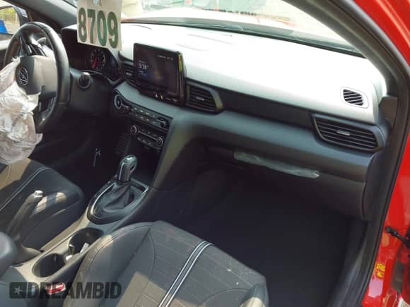 2022 Hyundai Veloster z VIN KMHT36AH5NU015388, wystawiony jako IAAI lot #42492097 z przebiegiem 31 757 mil mil oraz . Historia ofert i sprzedaży dostępna na DreamBid. Obrazek 5.