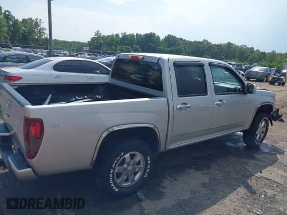 2011 Chevrolet Colorado 1LT z VIN 1GCHTCFEXB8131732, wystawiony jako IAAI lot #42595193 z przebiegiem 129 689 mil mil oraz . Historia ofert i sprzedaży dostępna na DreamBid. Obrazek 14.