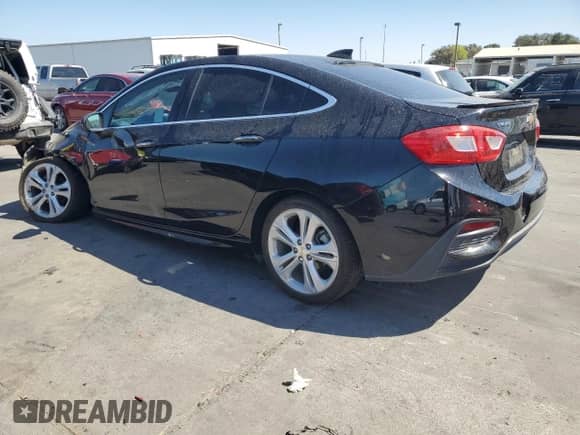 2016 Chevrolet Cruze Premier z VIN 1G1BG5SM5G7272460, wystawiony jako Copart lot #71534645 z przebiegiem 107 635 mil mil oraz Szkoda całkowita • Salvage title. Historia ofert i sprzedaży dostępna na DreamBid. Obrazek 2.