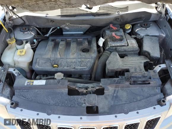 2014 Jeep Compass Sport с VIN 1C4NJDBB5ED926838, выставлен на аукционе Copart как лот 65840365 с пробегом 100 398 миль миль и Списание • Salvage title. История ставок и продаж доступна на DreamBid. Изображение 11.