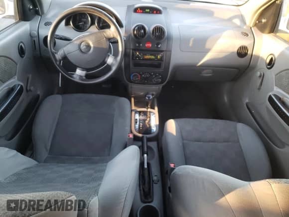 2005 Chevrolet Aveo LS z VIN KL1TD52665B331166, wystawiony jako Copart lot #79510054 z przebiegiem 165 471 mil mil oraz Szkoda całkowita • Salvage title. Historia ofert i sprzedaży dostępna na DreamBid. Obrazek 8.