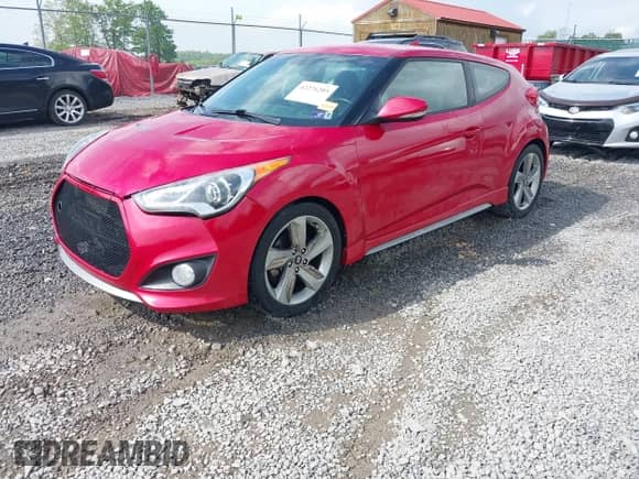 2013 Hyundai Veloster Turbo с VIN KMHTC6AE6DU146902, выставлен на аукционе IAAI как лот 42276203 с пробегом 117 752 миль миль и . История ставок и продаж доступна на DreamBid. Изображение 18.