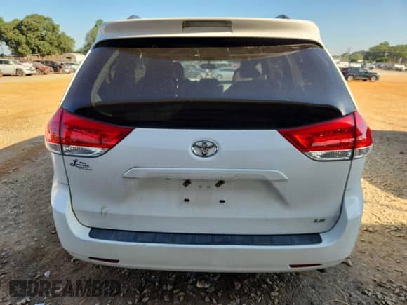 2012 Toyota Sienna LE with VIN 5TDKK3DC3CS180181, listed as a Copart auction lot 84601985 with 95,657 mi miles and Salvage title. Bid and sale history available at DreamBid. Image 6.