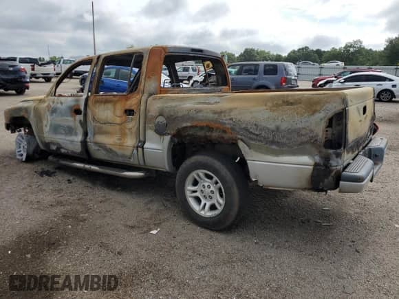 2003 Dodge Dakota Sport with VIN 1D7HG38N53S127292, listed as a Copart auction lot 62985315 with Not provided miles and Salvage title. Bid and sale history available at DreamBid. Image 2.