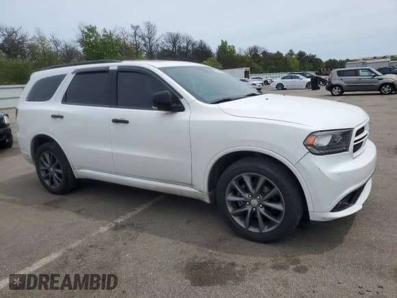 2018 Dodge Durango with VIN NY76958, listed as a Copart auction lot 55122245 with 102,413 mi miles and Salvage title. Bid and sale history available at DreamBid. Image 4.
