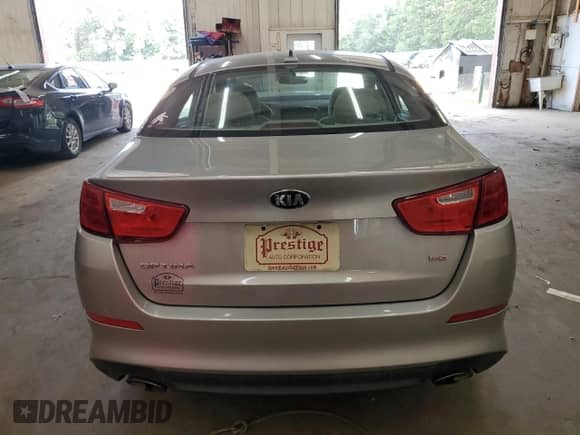 2015 Kia Optima LX с VIN 5XXGM4A71FG480515, выставлен на аукционе Copart как лот 71093775 с пробегом 203 616 миль миль и Списание • Salvage title. История ставок и продаж доступна на DreamBid. Изображение 6.