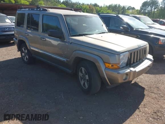2006 Jeep Commander with VIN 1J8HH48N76C293897, listed as a IAAI auction lot 42021253 with 214,412 mi miles and . Bid and sale history available at DreamBid. Image 1.