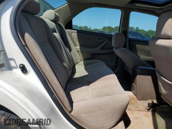 1999 Toyota Camry LE z VIN JT2BG28K1X0353937, wystawiony jako Copart lot #69913365 z przebiegiem 170 432 mil mil oraz Szkoda całkowita • Salvage title. Historia ofert i sprzedaży dostępna na DreamBid. Obrazek 10.