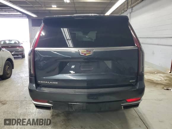 2021 Cadillac Escalade Premium Luxury with VIN 1GYS4CKL9MR231237, listed as a Copart auction lot 83996545 with 57,880 mi miles and Salvage title. Bid and sale history available at DreamBid. Image 6.