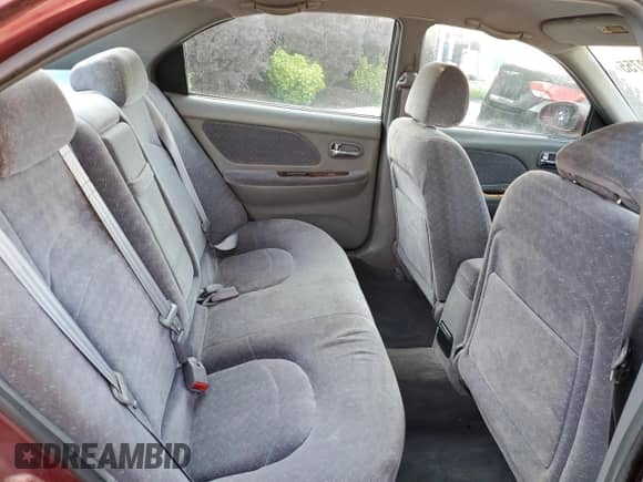 2000 Hyundai Sonata GLS z VIN KMHWF35V5YA259583, wystawiony jako Copart lot #65552755 z przebiegiem 102 922 mil mil oraz Nie do naprawy • Non repairable. Historia ofert i sprzedaży dostępna na DreamBid. Obrazek 10.