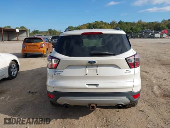 2017 Ford Escape SE with VIN 1FMCU9G94HUB77175, listed as a IAAI auction lot 43359533 with 153,347 mi miles and . Bid and sale history available at DreamBid. Image 16.