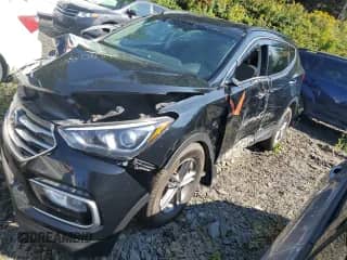 2018 Hyundai Santa Fe 2.4L с VIN 5NMZT3LB5JH091653, выставлен на аукционе Copart как лот 68206235 с пробегом 67 162 миль миль и Списание • Salvage title. История ставок и продаж доступна на DreamBid. Изображение 1.