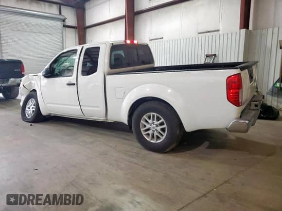 2017 Nissan Frontier SV with VIN 1N6BD0CTXHN737530, listed as a Copart auction lot 70869045 with 95,789 mi miles and Salvage title. Bid and sale history available at DreamBid. Image 2.