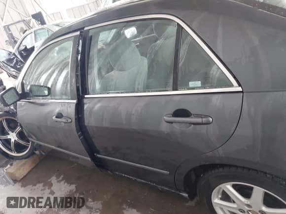 2003 Honda Accord LX with VIN 1HGCM55303A105641, listed as a IAAI auction lot 41624982 with 311,712 mi miles and . Bid and sale history available at DreamBid. Image 14.