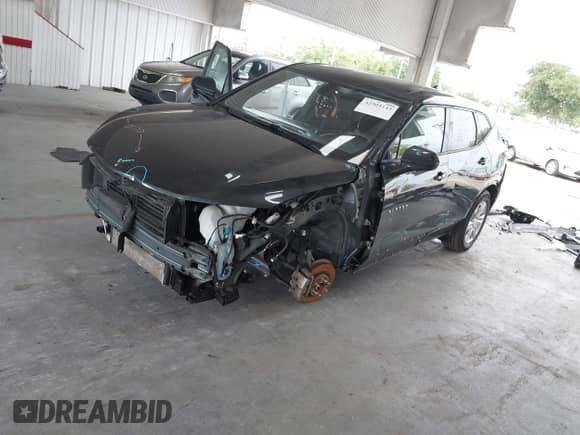 2019 Chevrolet Blazer with VIN 3GNKBBRAXKS596263, listed as a IAAI auction lot 42903143 with 127,850 mi miles and . Bid and sale history available at DreamBid. Image 2.