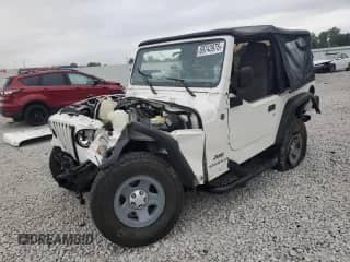 2004 Jeep Wrangler SE z VIN 1J4FA29114P753042, wystawiony jako Copart lot #69743975 z przebiegiem Nie podano mil oraz Szkoda całkowita • Salvage title. Historia ofert i sprzedaży dostępna na DreamBid. Obrazek 1.