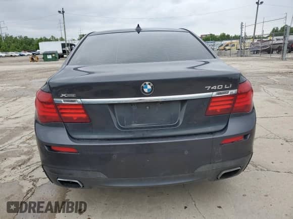 2013 BMW 7 Series 740Li xDrive with VIN WBAYF4C58DD127915, listed as a Copart auction lot 57797565 with 167,513 mi miles and Salvage title. Bid and sale history available at DreamBid. Image 6.