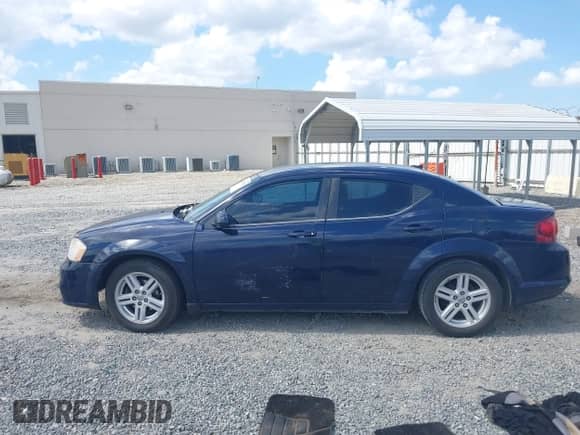 2013 Dodge Avenger SXT with VIN 1C3CDZCBXDN615817, listed as a IAAI auction lot 43282287 with 245,259 mi miles and . Bid and sale history available at DreamBid. Image 14.