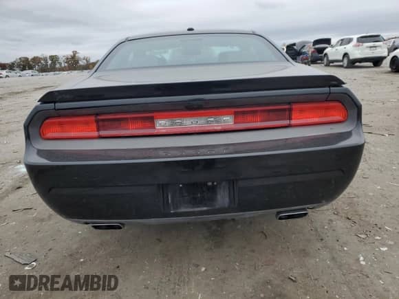 2012 Dodge Challenger SXT с VIN 2C3CDYAG8CH196303, выставлен на аукционе Copart как лот 90491975 с пробегом 126 383 миль миль и Чистый • Clean title. История ставок и продаж доступна на DreamBid. Изображение 6.