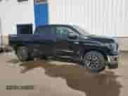 2021 Toyota Tundra SR5 with VIN 5TFDY5F13MX996740, listed as a Copart auction lot 56096205 with 157,370 mi miles and Salvage title. Bid and sale history available at DreamBid. Image 4.