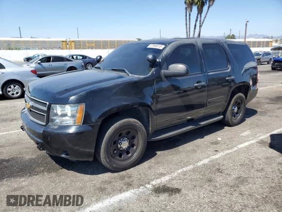 2013 Chevrolet Tahoe Commercial with VIN 1GNLC2E00DR256429, listed as a Copart auction lot 67590515 with Not provided miles and Salvage title. Bid and sale history available at DreamBid. Image 1.