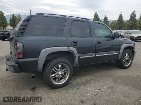 2004 Chevrolet Tahoe LT с VIN 1GNEC13T74R276242, выставлен на аукционе Copart как лот 70556415 с пробегом 177 615 миль миль и Списание • Salvage title. История ставок и продаж доступна на DreamBid. Изображение 3.