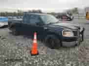 2005 Ford F-150 XLT with VIN 1FTPX12595NA46140, listed as a Copart auction lot 82141515 with 156,879 mi miles and Salvage title. Bid and sale history available at DreamBid. Image 4.