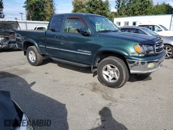 2002 Toyota Tundra Limited z VIN 5TBBT48152S291074, wystawiony jako Copart lot #81852585 z przebiegiem 269 192 mil mil oraz Szkoda całkowita • Salvage title. Historia ofert i sprzedaży dostępna na DreamBid. Obrazek 4.