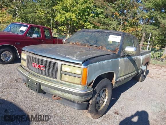 1991 GMC Sierra 1500 with VIN 2GTEK19K4M1502143, listed as a IAAI auction lot 43368830 with 190,000 mi miles and . Bid and sale history available at DreamBid. Image 6.