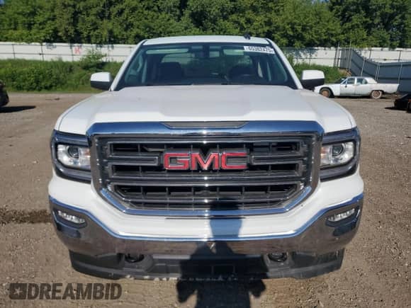 2018 GMC Sierra 1500 SLE z VIN 2GTV2MECXJ1110666, wystawiony jako Copart lot #65382475 z przebiegiem Nie podano mil oraz Czysty tytuł • Clean title. Historia ofert i sprzedaży dostępna na DreamBid. Obrazek 5.