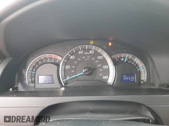 2012 Toyota Camry XLE z VIN 4T1BF1FK0CU621950, wystawiony jako Copart lot #81957955 z przebiegiem 166 528 mil mil oraz Szkoda całkowita • Salvage title. Historia ofert i sprzedaży dostępna na DreamBid. Obrazek 9.