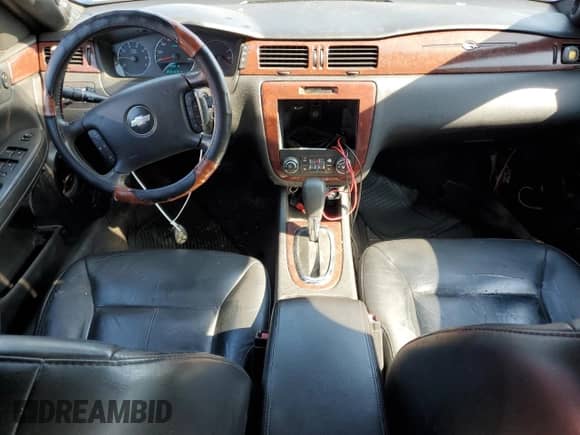 2006 Chevrolet Impala LTZ с VIN 2G1WU581569127598, выставлен на аукционе Copart как лот 70893175 с пробегом 294 523 миль миль и Списание • Salvage title. История ставок и продаж доступна на DreamBid. Изображение 8.