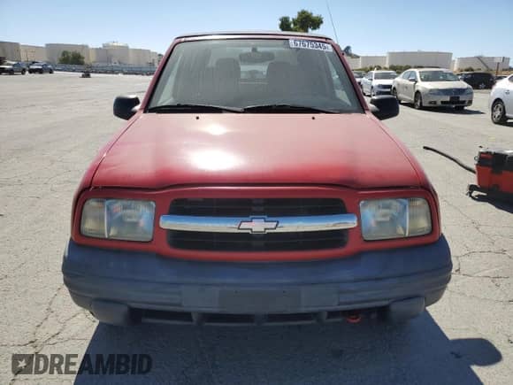 1999 Chevrolet Tracker z VIN 2CNBE18C9X6904523, wystawiony jako Copart lot #67675345 z przebiegiem 124 806 mil mil oraz Czysty tytuł • Clean title. Historia ofert i sprzedaży dostępna na DreamBid. Obrazek 5.