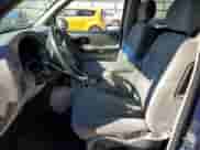 2003 Chevrolet TrailBlazer LS with VIN 1GNDS13S232348235, listed as a Copart auction lot 82674205 with 197,084 mi miles and Salvage title. Bid and sale history available at DreamBid. Image 7.