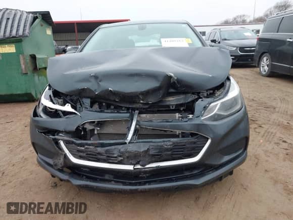 2017 Chevrolet Cruze LT z VIN 3G1BE6SM3HS548584, wystawiony jako IAAI lot #41208267 z przebiegiem 105 807 mil mil oraz . Historia ofert i sprzedaży dostępna na DreamBid. Obrazek 6.