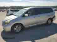 2005 Honda Odyssey EX z VIN 5FNRL38405B418106, wystawiony jako Copart lot #69424465 z przebiegiem 186 798 mil mil oraz Szkoda całkowita • Salvage title. Historia ofert i sprzedaży dostępna na DreamBid. Obrazek 1.