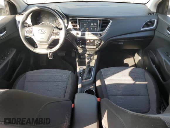 2018 Hyundai Accent Limited с VIN 3KPC34A39JE035147, выставлен на аукционе Copart как лот 60143795 с пробегом 13 412 миль миль и Списание • Salvage title. История ставок и продаж доступна на DreamBid. Изображение 8.