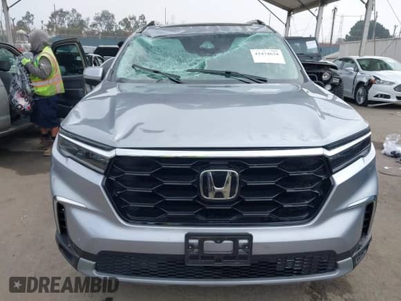 2023 Honda Pilot Touring с VIN 5FNYG1H78PB030638, выставлен на аукционе IAAI как лот 42474634 с пробегом 25 513 миль миль и . История ставок и продаж доступна на DreamBid. Изображение 12.