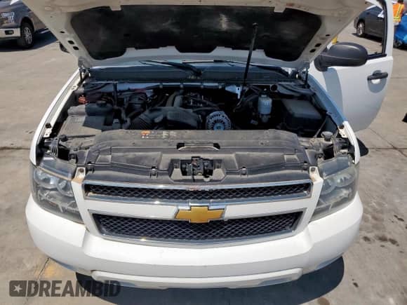 2013 Chevrolet Tahoe Commercial z VIN 1GNSK2E09DR349030, wystawiony jako Copart lot #69140325 z przebiegiem 163 621 mil mil oraz Czysty tytuł • Clean title. Historia ofert i sprzedaży dostępna na DreamBid. Obrazek 12.