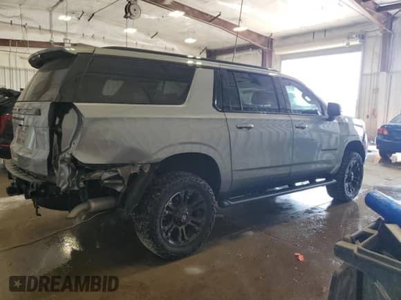 2023 Chevrolet Suburban Z71 with VIN 1GNSKDKD7PR219240, listed as a Copart auction lot 67590975 with 48,749 mi miles and Salvage title. Bid and sale history available at DreamBid. Image 3.