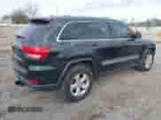2012 Jeep Grand Cherokee Laredo z VIN 1C4RJEAG2CC258519, wystawiony jako IAAI lot #43517274 z przebiegiem 187 354 mil mil oraz . Historia ofert i sprzedaży dostępna na DreamBid. Obrazek 4.