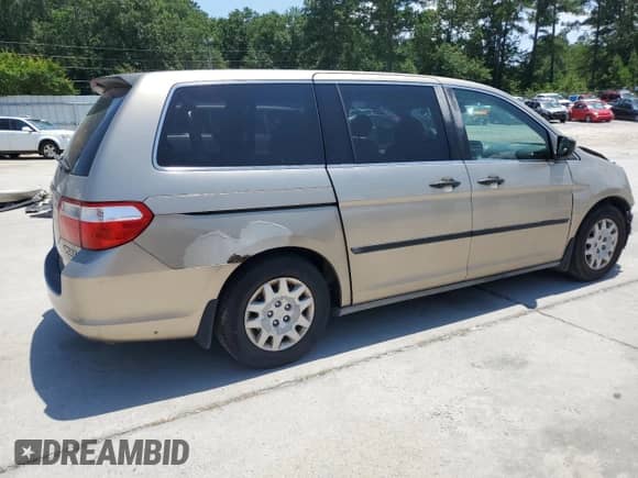 2005 Honda Odyssey LX with VIN 5FNRL38265B040940, listed as a Copart auction lot 65104285 with 299,632 mi miles and Salvage title. Bid and sale history available at DreamBid. Image 3.